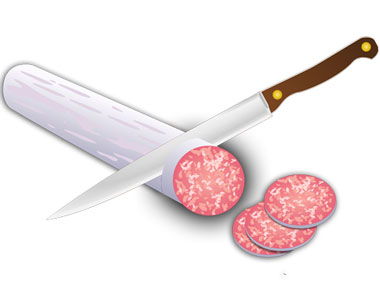 Messer schneidet Karotte